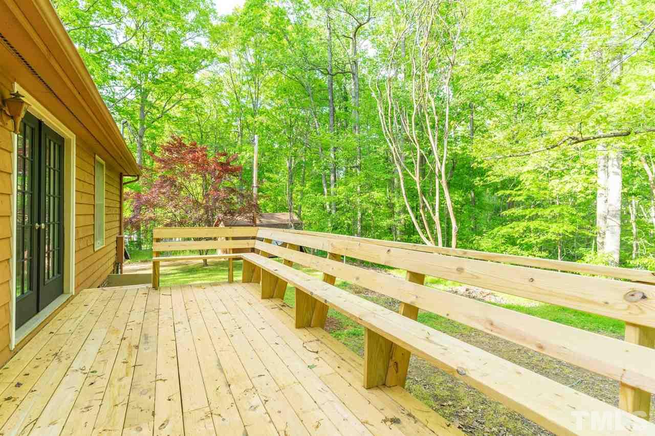 1508 Lawrence Road Creedmoor, NC 27522 - Photo 8 of 11 Back deck over looking backyard. Listen to the creek while enjoying your morning coffee