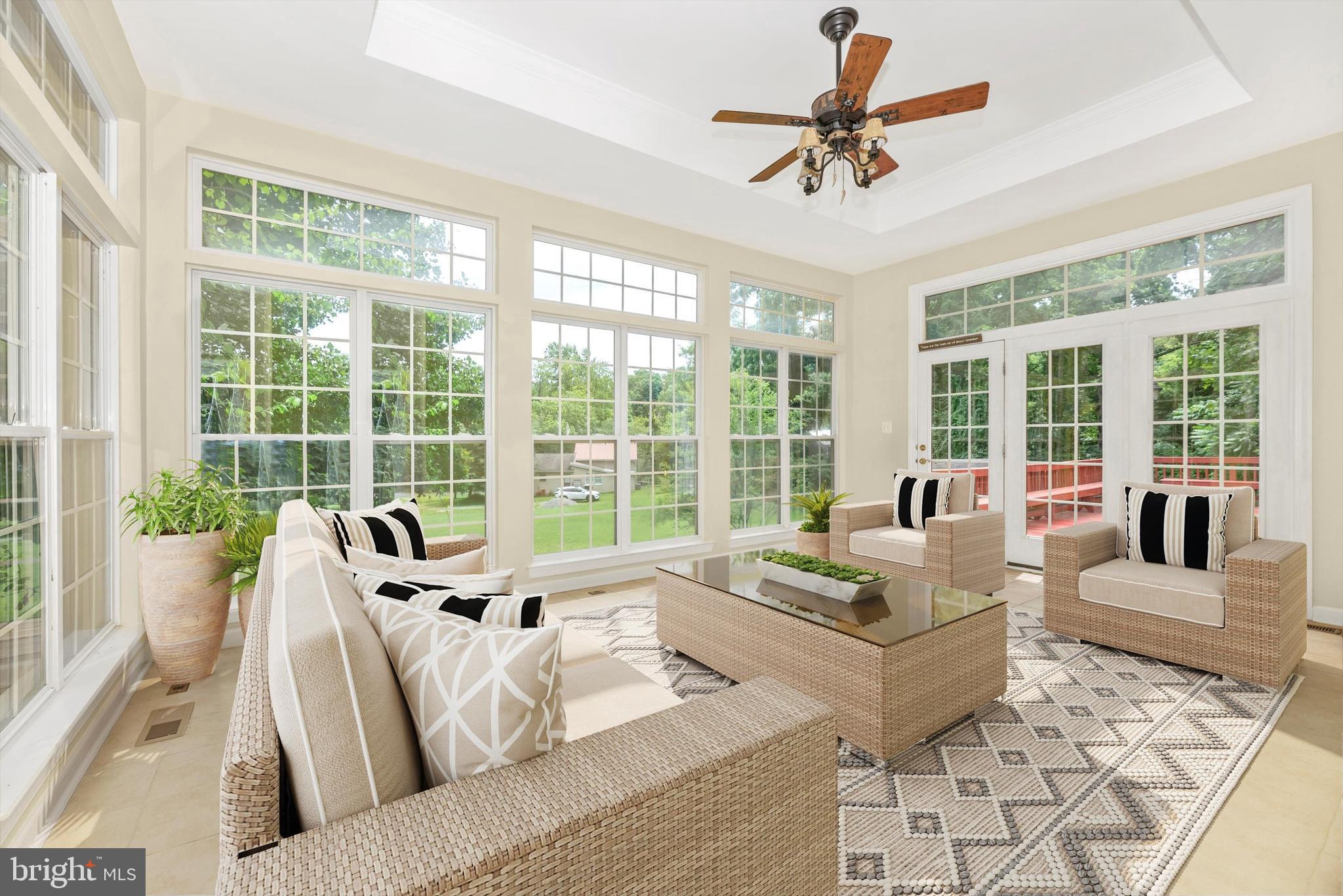 6636 South Clifton Road Frederick, MD 21703 - Photo 29 of 81 a living room with furniture and a large window