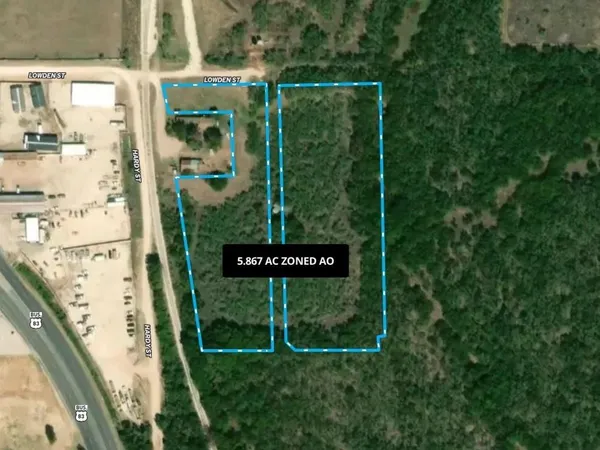 a sign broad on the side of the road