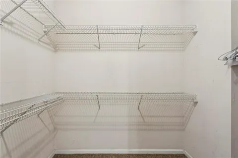 a view of a room with racks on the wall