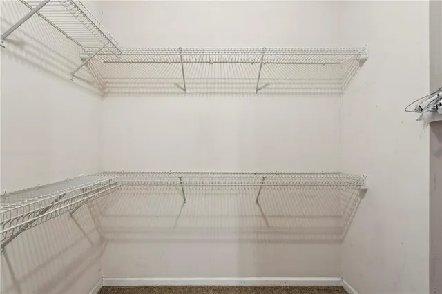 a view of a room with racks on the wall