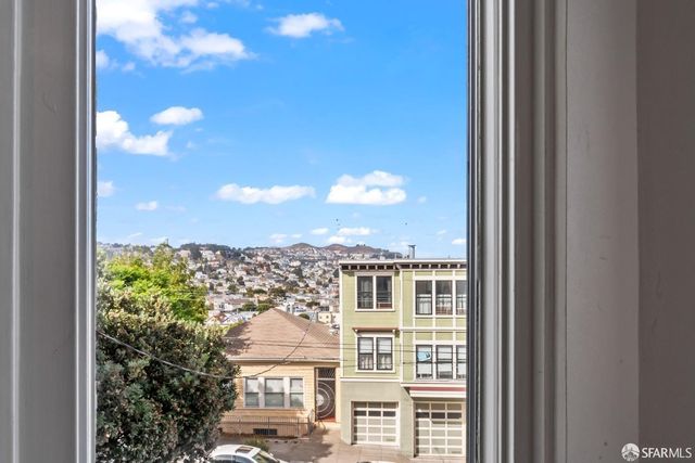 a view of a city from a balcony