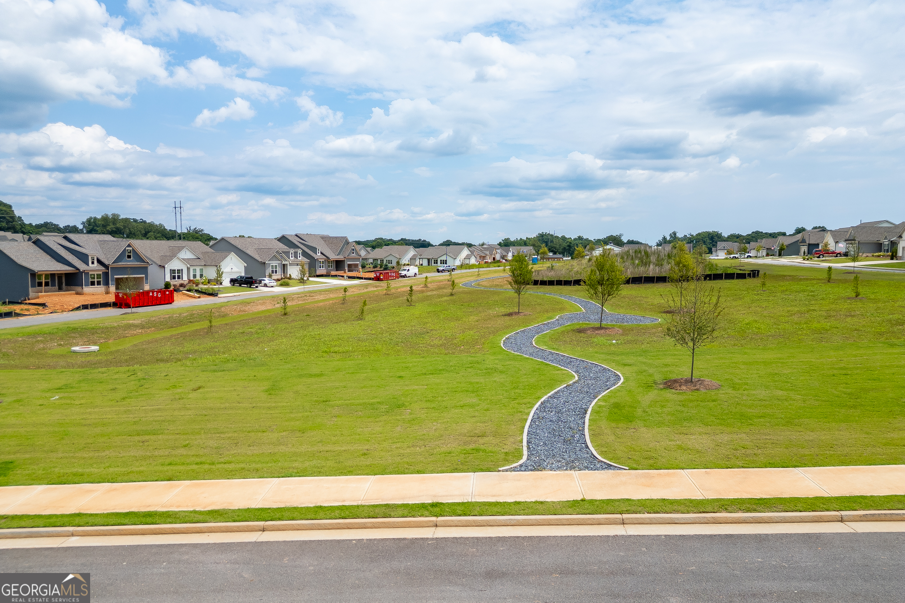 85 Merwood Lane, Unit 116 Jefferson, GA 30549 - Photo 4 of 68 Enjoy the beauty of the community green space from your covered front porch.