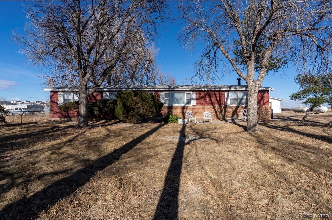12169 East Baseline Road Lafayette, CO 80026 - Photo 27 of 39 a view of street with wooden bridge