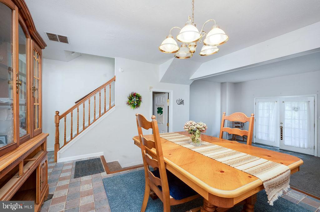 1261 Fox Run Reading, PA 19606 - Photo 17 of 46 a view of a dining room with furniture and a chandelier