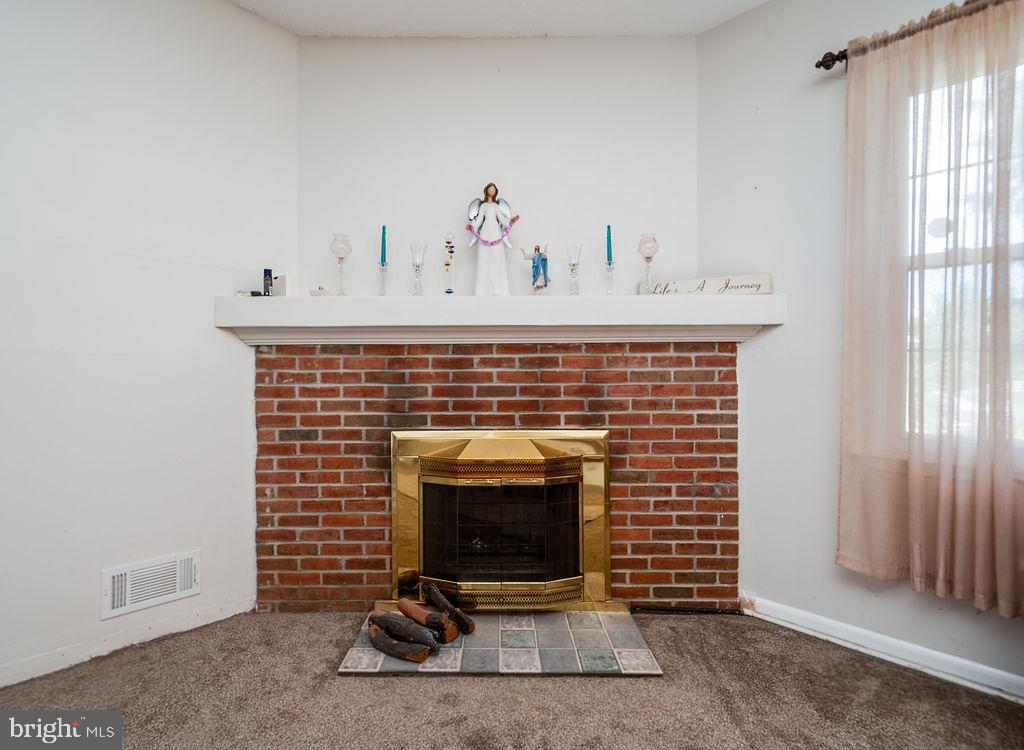 1261 Fox Run Reading, PA 19606 - Photo 22 of 46 a view of fireplace with livingroom