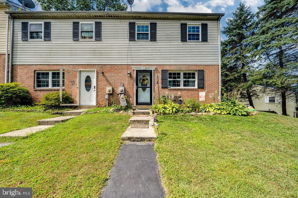 1261 Fox Run Reading, PA 19606 - Photo 4 of 46 a front view of house with yard