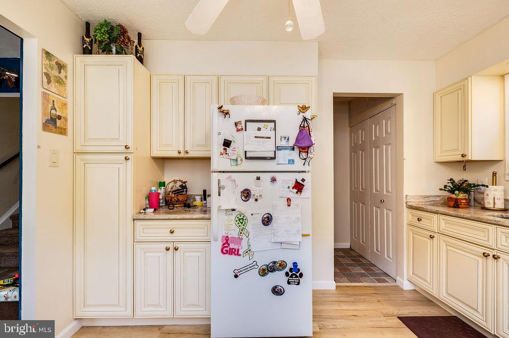 1261 Fox Run Reading, PA 19606 - Photo 8 of 46 a kitchen with white cabinets and appliances