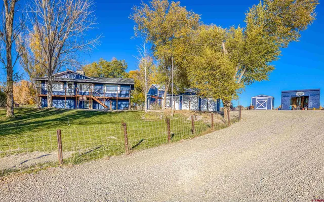 a view of an house with swimming pool