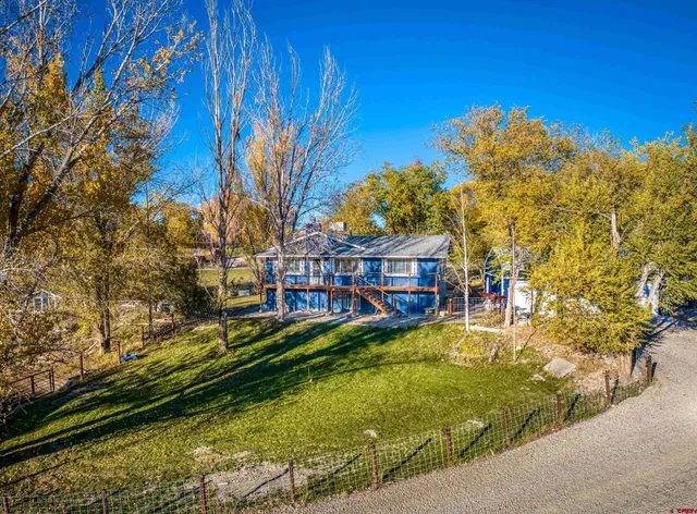 a view of swimming pool with seating space