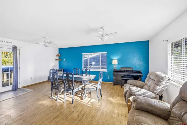a view of a dining room with furniture