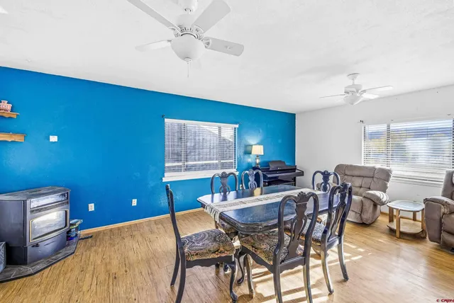 a view of a dining room with furniture