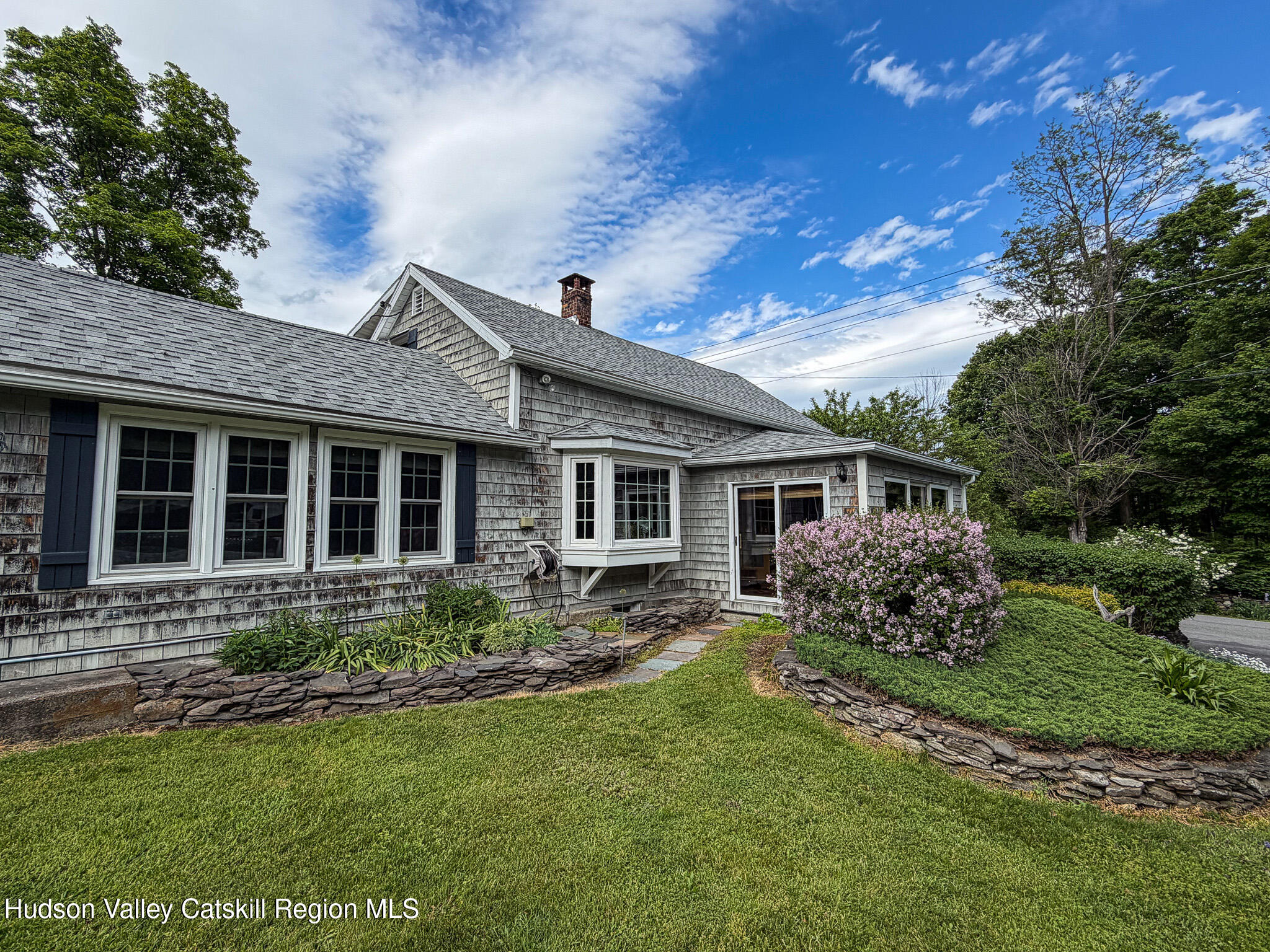 221 Camp Medusa Road Rensselaerville, NY 12120 - Photo 38 of 57 a view of a house with backyard and garden