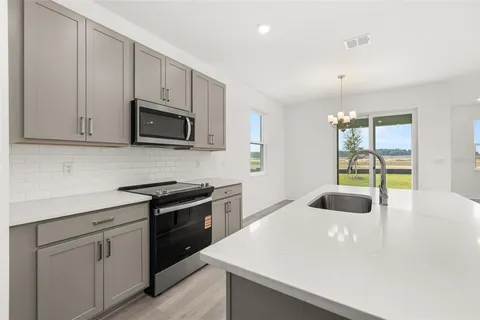 $354,990 | 1014 Swamp Chestnut Loop, Lady Lake, FL 32159