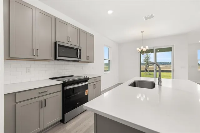 $354,990 | 1014 Swamp Chestnut Loop, Lady Lake, FL 32159