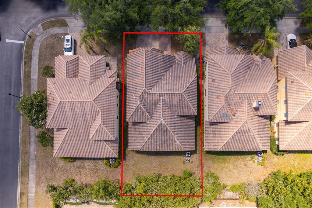 6825 Dolce Way Orlando, FL 32819 - Photo 3 of 40 an aerial view of residential houses with outdoor space and ocean view