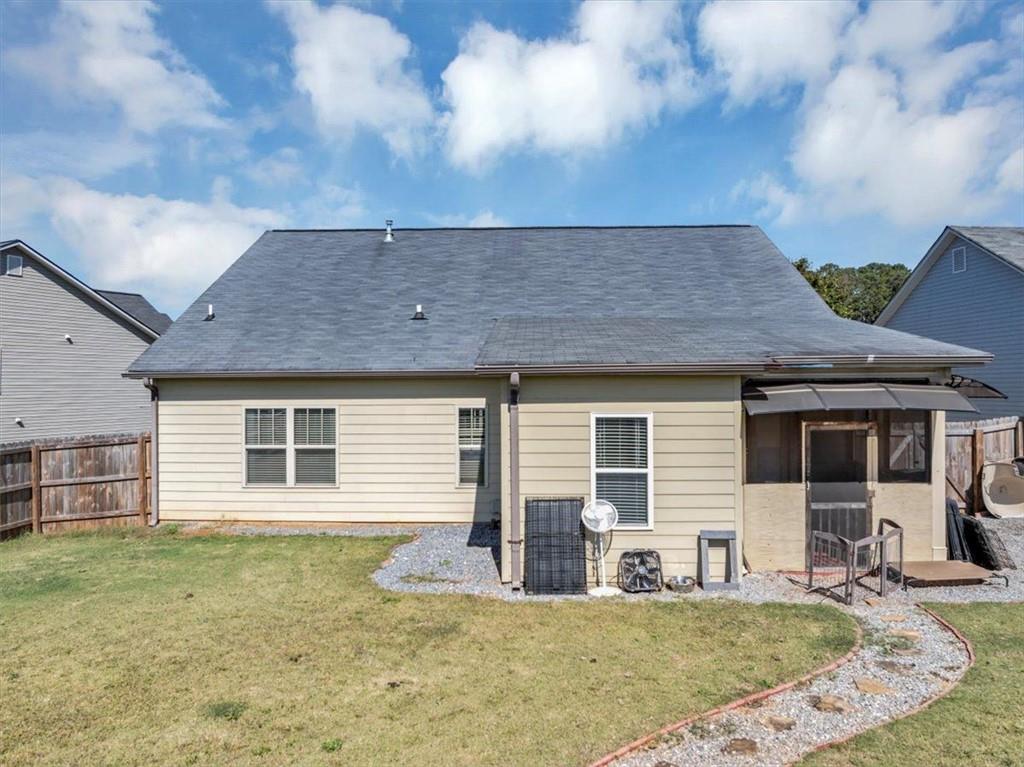 229 Summer Gate Lane Villa Rica, GA 30180 - Photo 24 of 28 a view of a house with backyard and sitting area