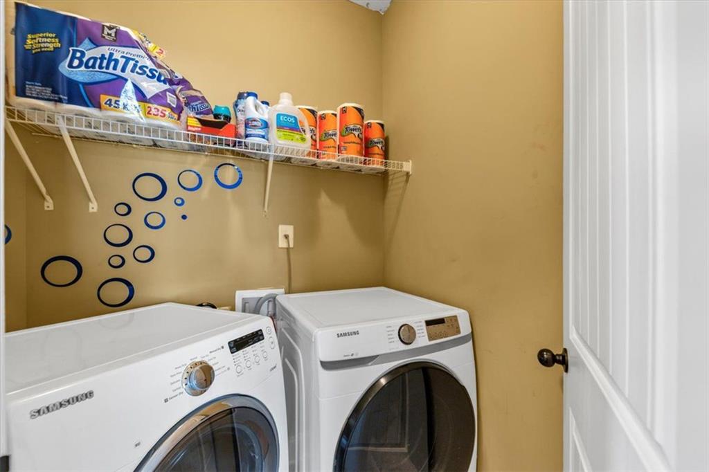 229 Summer Gate Lane Villa Rica, GA 30180 - Photo 10 of 28 a utility room with dryer and washer