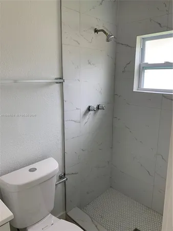 a bathroom with a sink and vanity