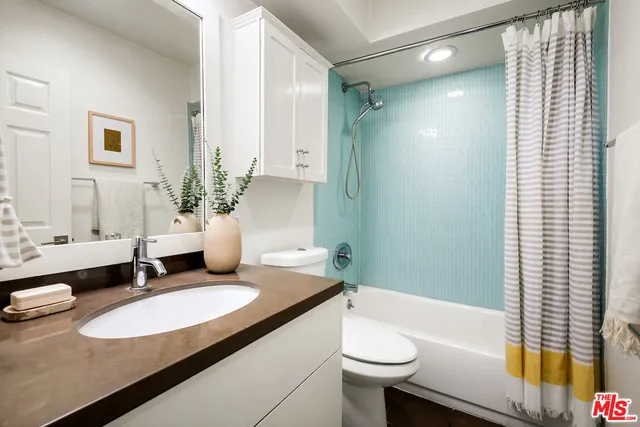 a view of a building with a street sign