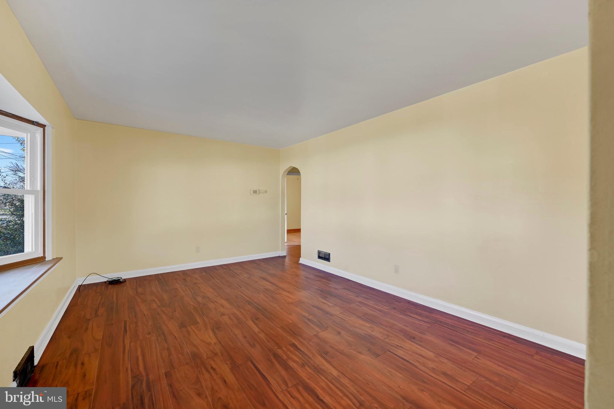 38 Mitchell Avenue Aberdeen, MD 21001 - Photo 4 of 15 a view of a room with wooden floor and a window