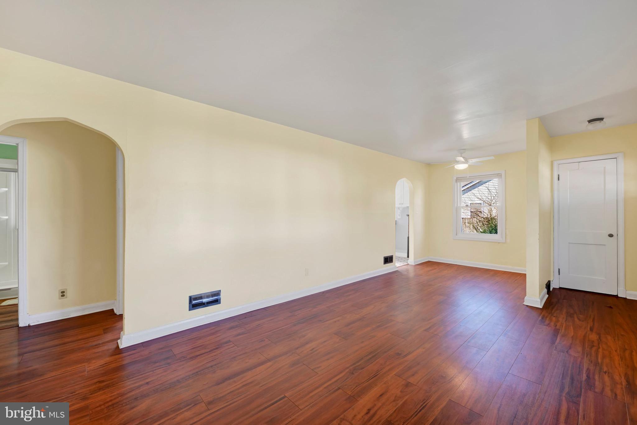 38 Mitchell Avenue Aberdeen, MD 21001 - Photo 5 of 15 an empty room with wooden floor and windows