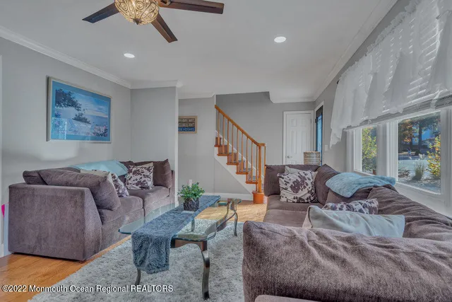 a kitchen with stainless steel appliances granite countertop a stove and a refrigerator