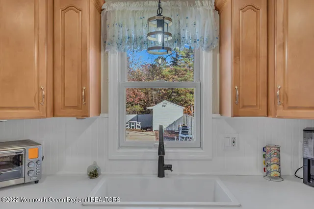 a bed room with furniture and a dresser