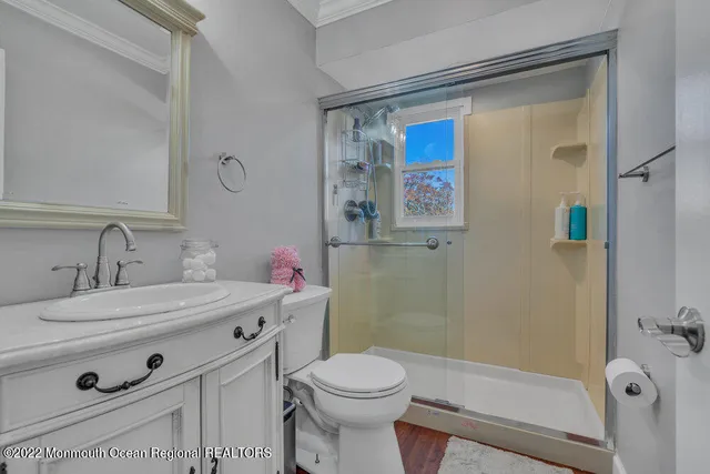 a view of a street with a building in the background