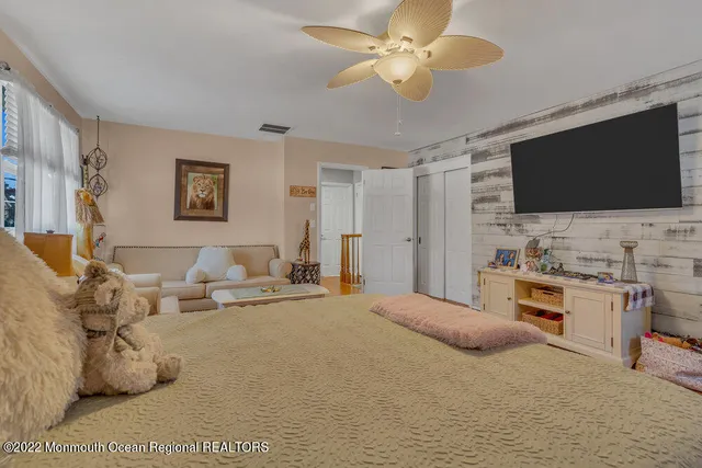 a view of a street with houses on both side of it