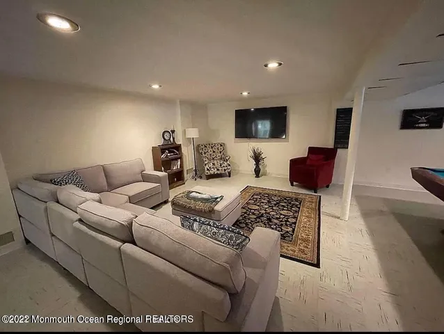 a view of a kitchen with a sink and cabinets