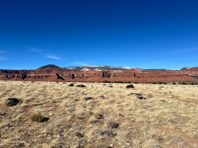 123 Teasdale Powerline Road Torrey, UT 84773 - Photo 6 of 62 View of mountain background with rural landscape