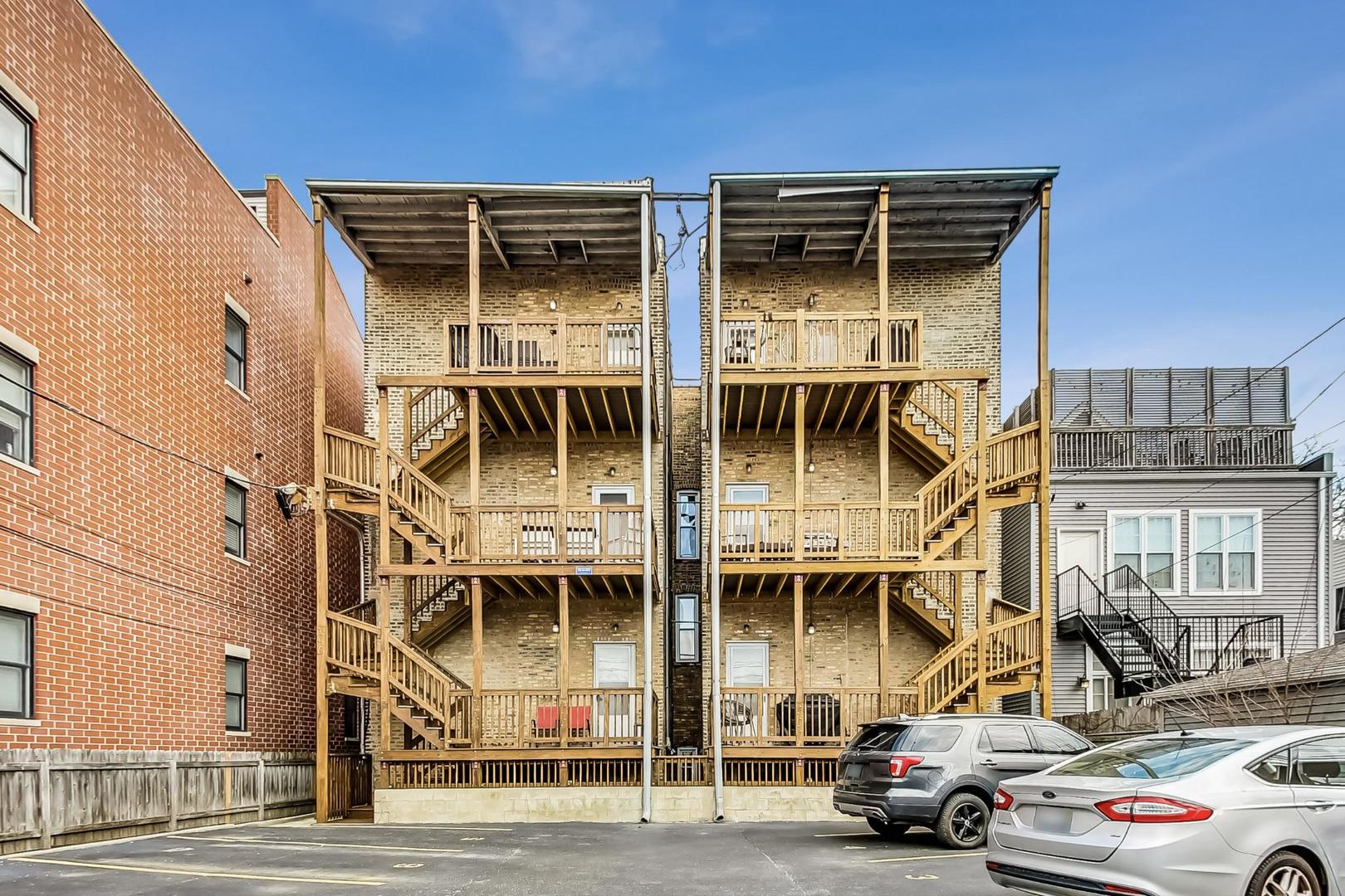 3734 North Clifton Avenue, Unit G Chicago, IL 60613 - Photo 22 of 27 front view of a building with a street