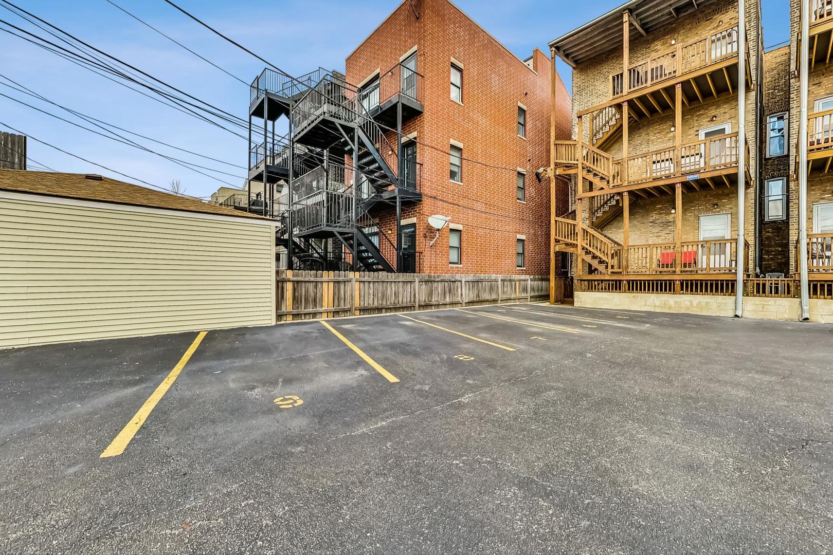 3734 North Clifton Avenue, Unit G Chicago, IL 60613 - Photo 24 of 27 a view of a house with a street