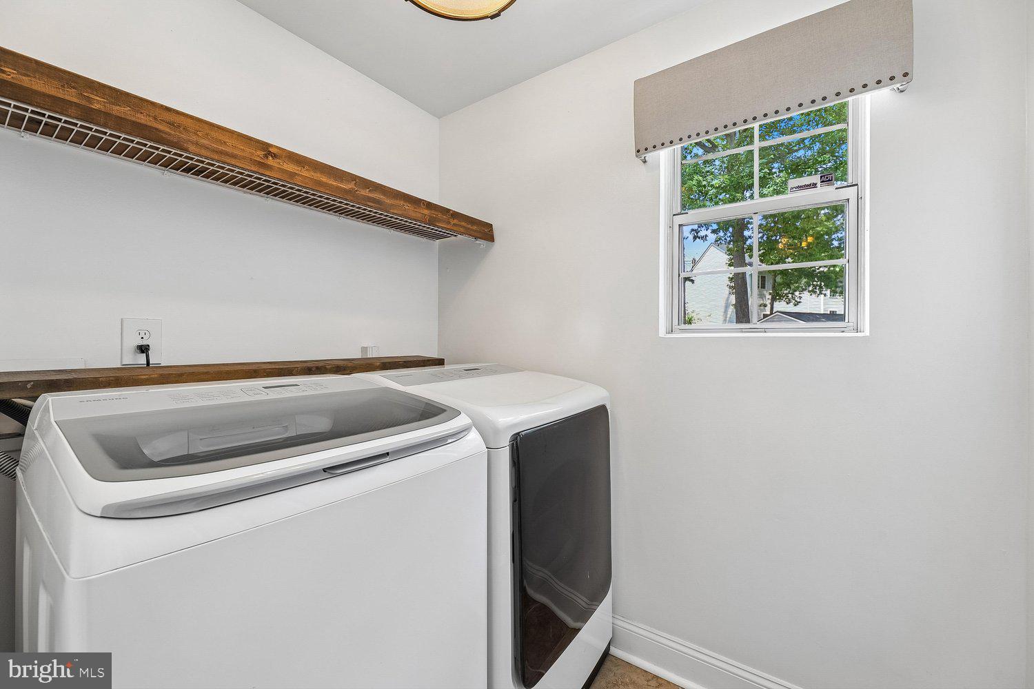 15764 Beau Ridge Drive Woodbridge, VA 22193 - Photo 18 of 58 a utility room with dryer and washer