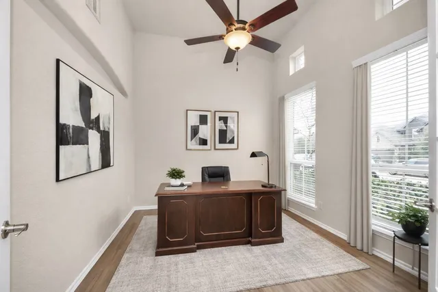 a bedroom with furniture and a window