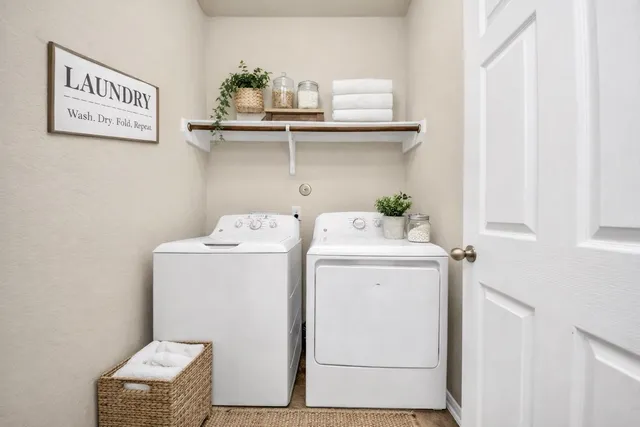 a utility room with dryer and washer