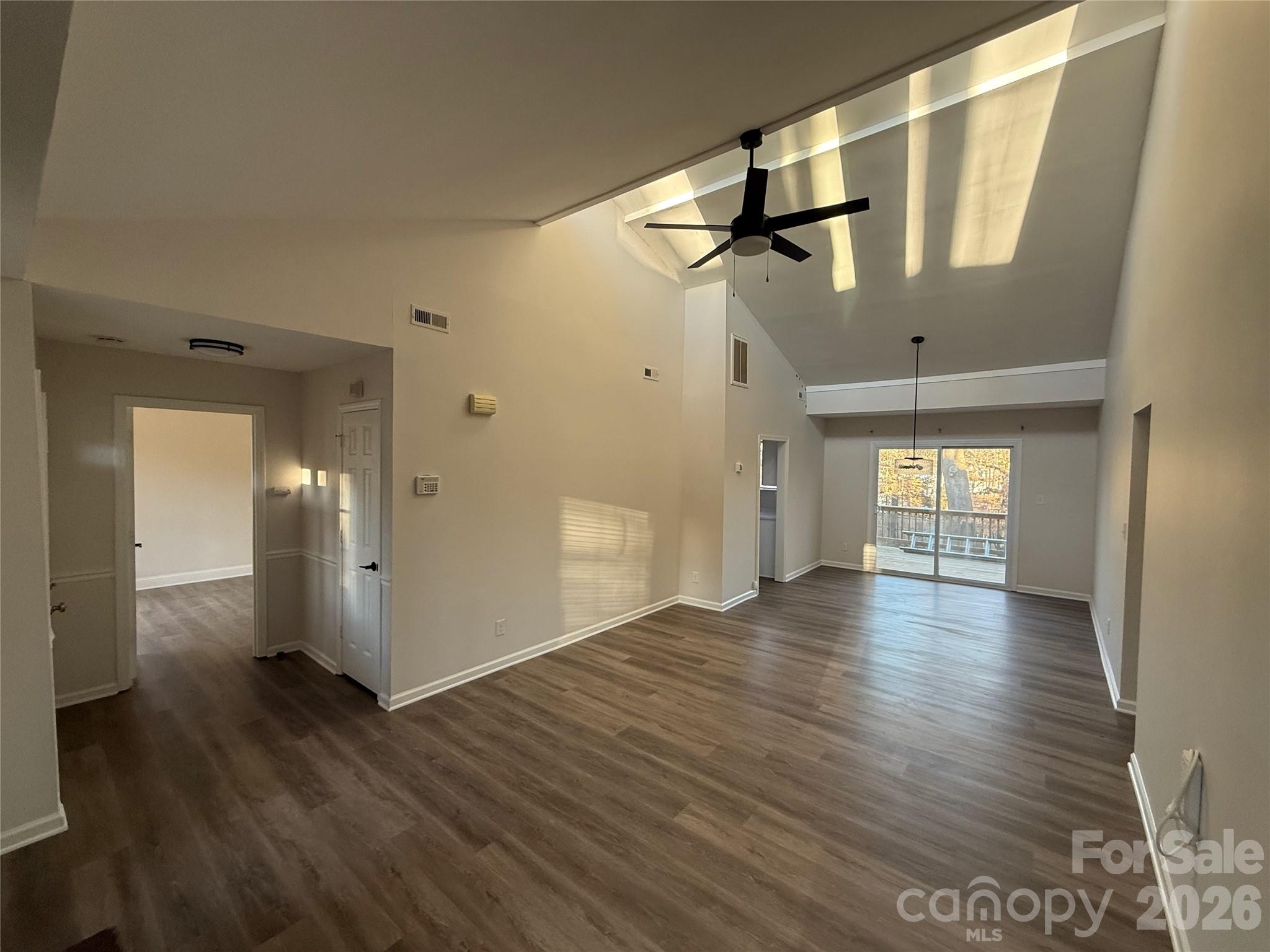 10129 Rockwood Road Charlotte, NC 28215 - Photo 1 of 36 a view of a hallway with wooden floor