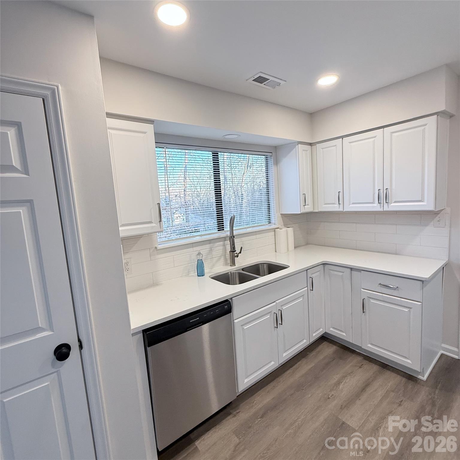 10129 Rockwood Road Charlotte, NC 28215 - Photo 8 of 36 a kitchen with sink and cabinets