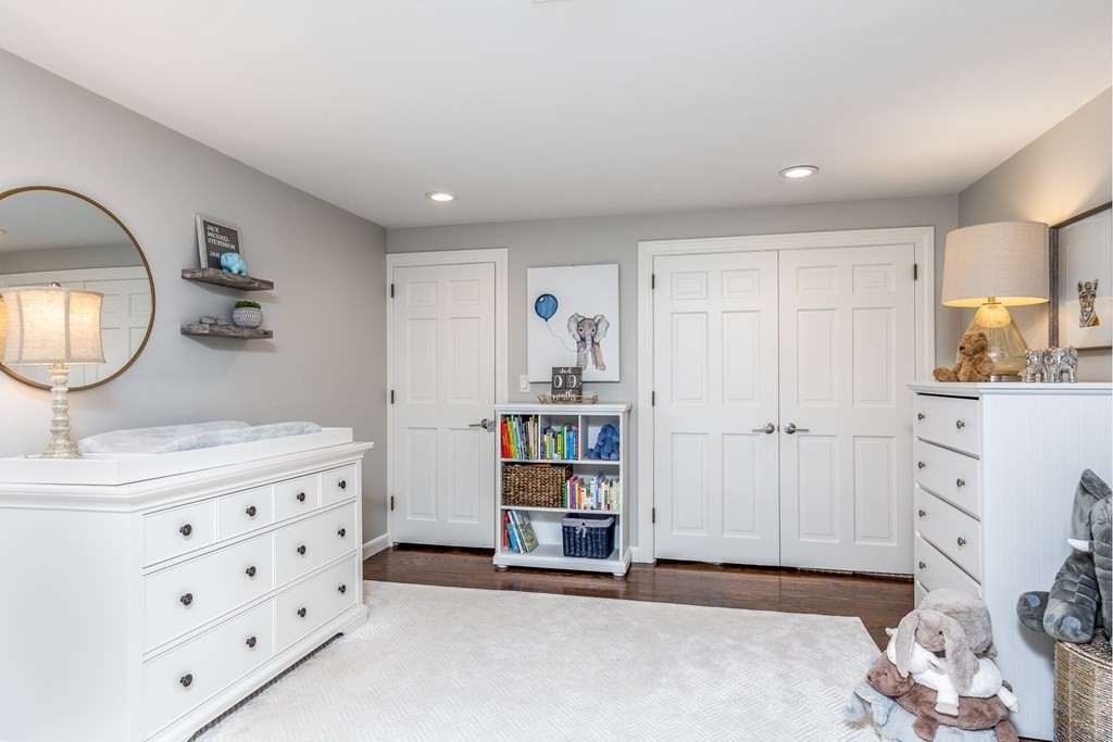 15 Carlton Road Marblehead, MA 01945 - Photo 25 of 37 a living room with furniture a mirror and dresser