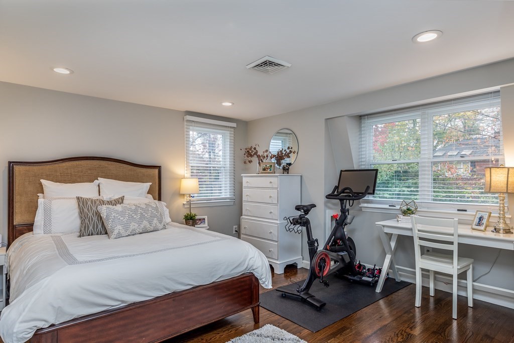 15 Carlton Road Marblehead, MA 01945 - Photo 27 of 37 a bedroom with a bed and large windows