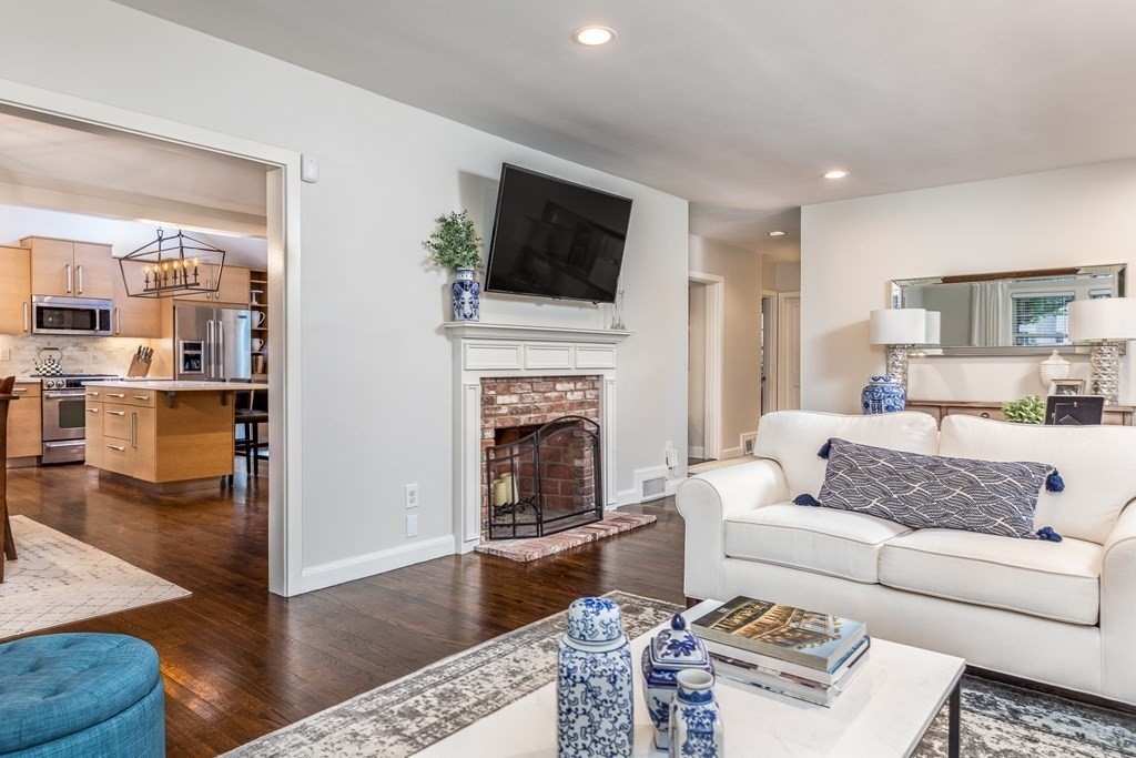 15 Carlton Road Marblehead, MA 01945 - Photo 5 of 37 a living room with furniture fireplace and flat screen tv