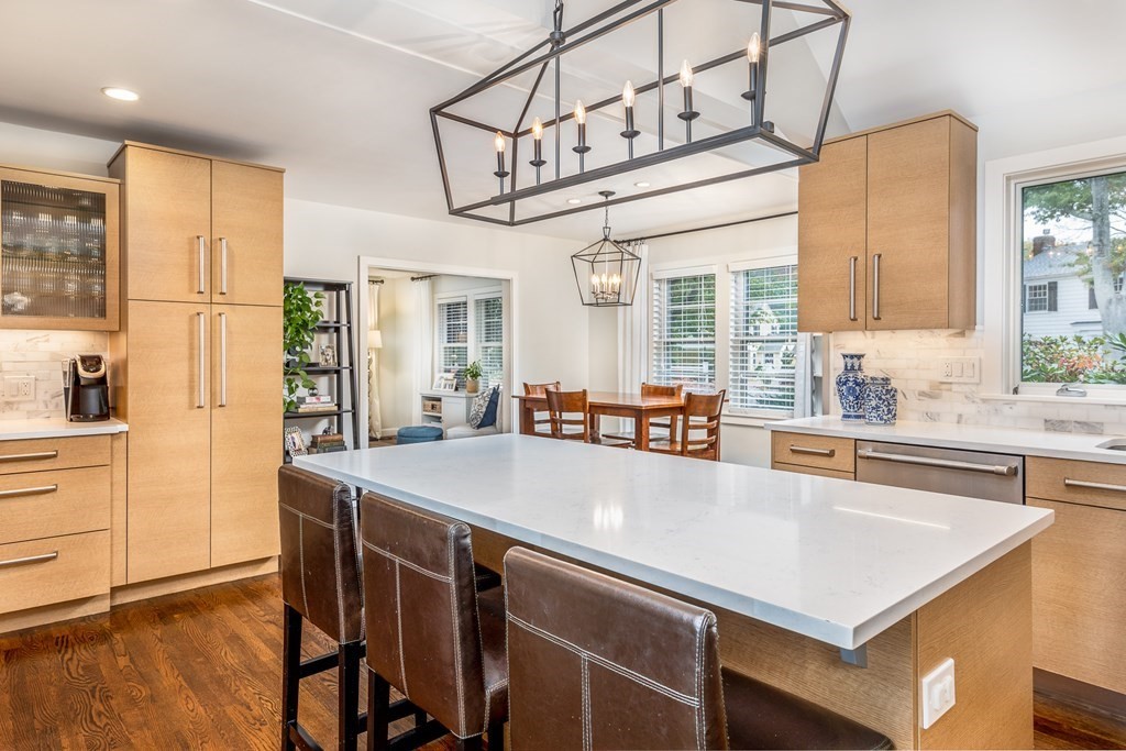 15 Carlton Road Marblehead, MA 01945 - Photo 8 of 37 a large kitchen with a table and chairs