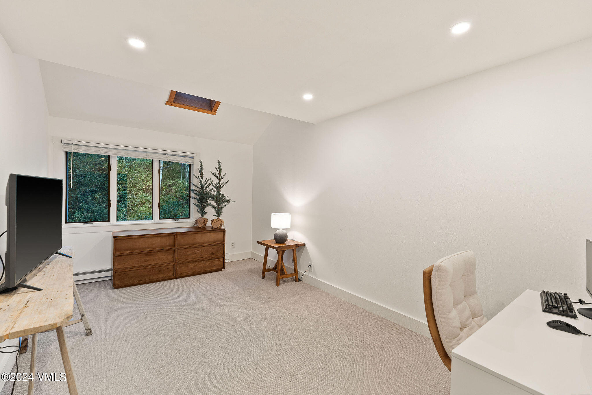 3094 Booth Falls Road, Unit 14 Vail, CO 81657 - Photo 20 of 36 a room with furniture and a window