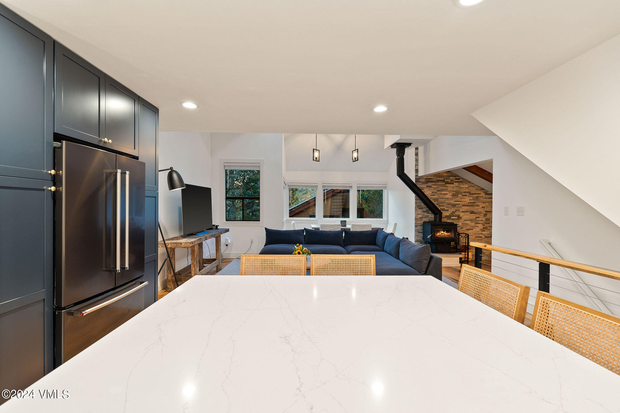 3094 Booth Falls Road, Unit 14 Vail, CO 81657 - Photo 2 of 36 a large kitchen with stainless steel appliances kitchen island a large island in the center
