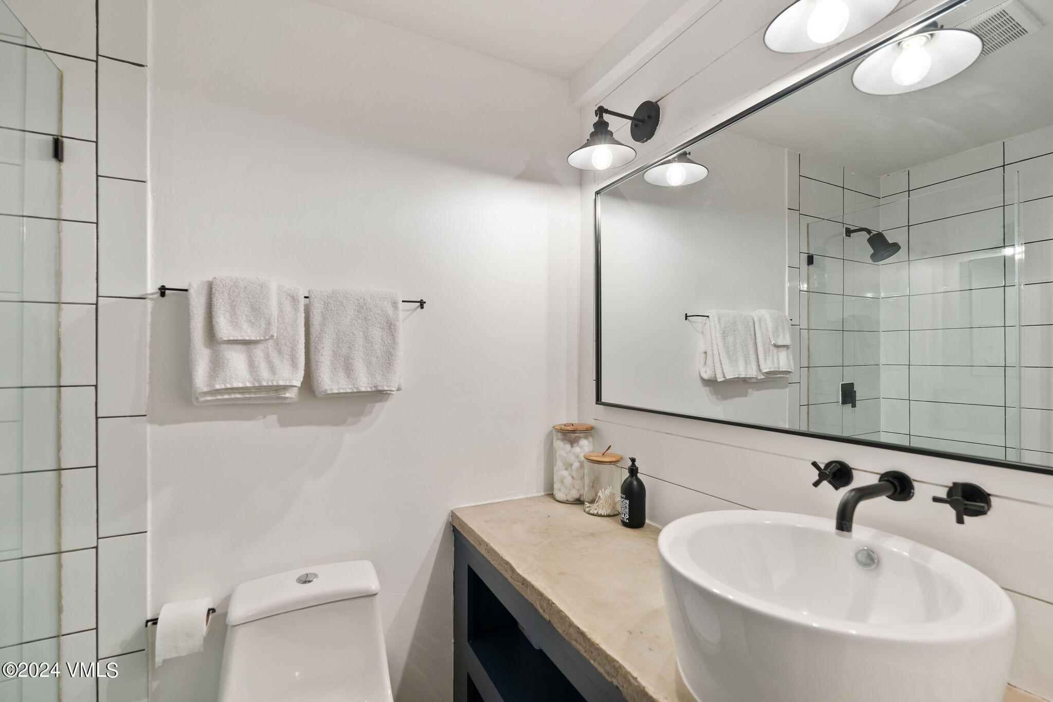 3094 Booth Falls Road, Unit 14 Vail, CO 81657 - Photo 24 of 36 a bathroom with a sink and a mirror