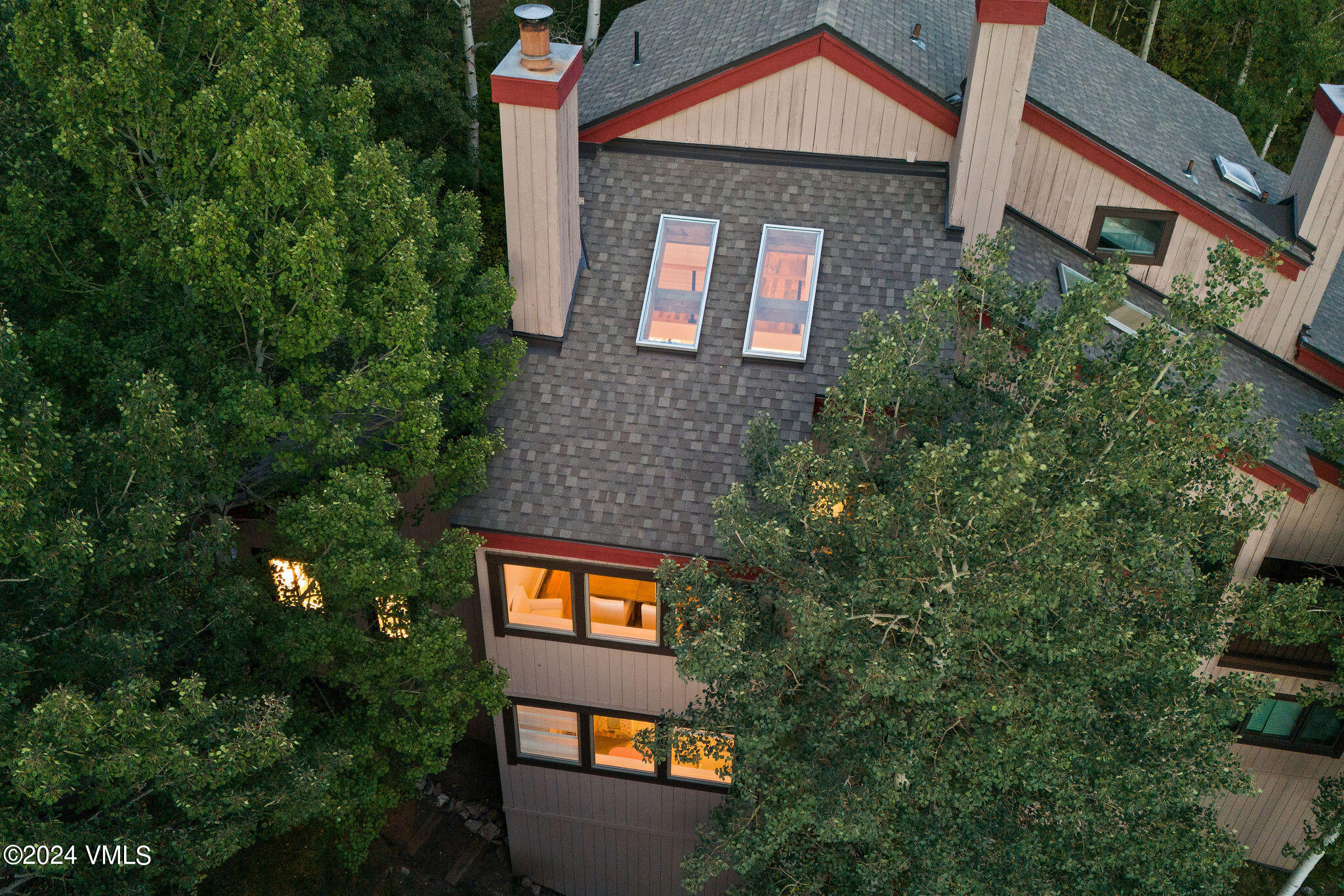 3094 Booth Falls Road, Unit 14 Vail, CO 81657 - Photo 28 of 36 a front view of a house with yard