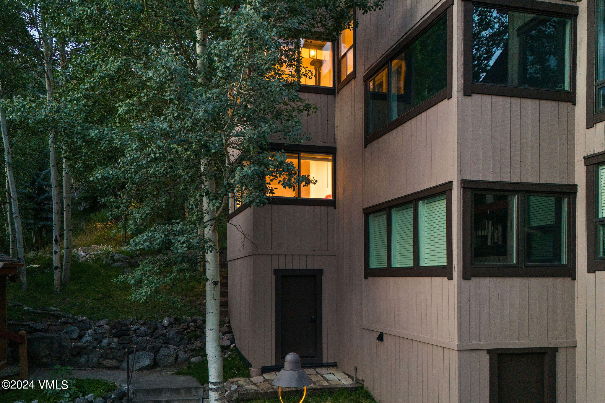 3094 Booth Falls Road, Unit 14 Vail, CO 81657 - Photo 29 of 36 a view of a house with a balcony