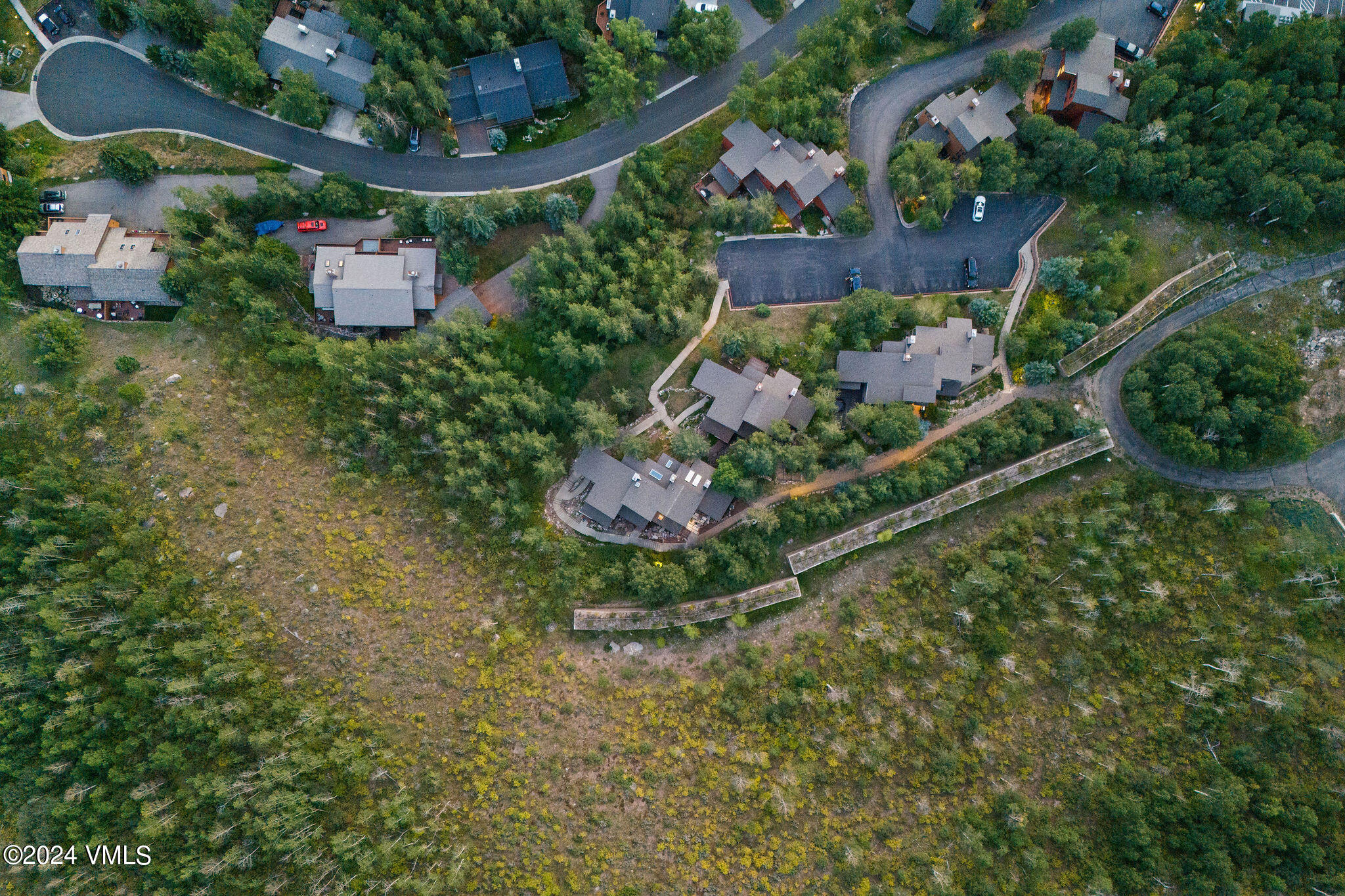 3094 Booth Falls Road, Unit 14 Vail, CO 81657 - Photo 33 of 36 an aerial view of a house with a yard and outdoor seating
