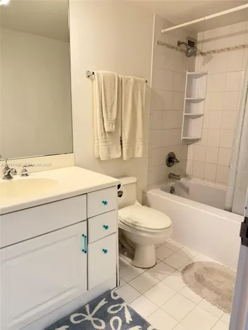 a room with a wooden floor and a window